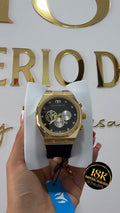 Reloj deportivo negro y oro rosa